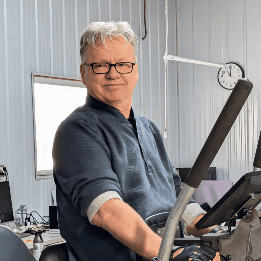 Technician operating machinery at WalkPort for innovative mobility solutions.