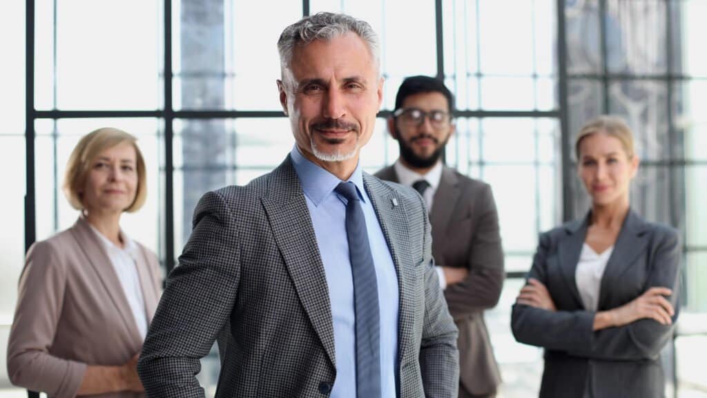 Professional business team in modern office for WalkPort sales network.