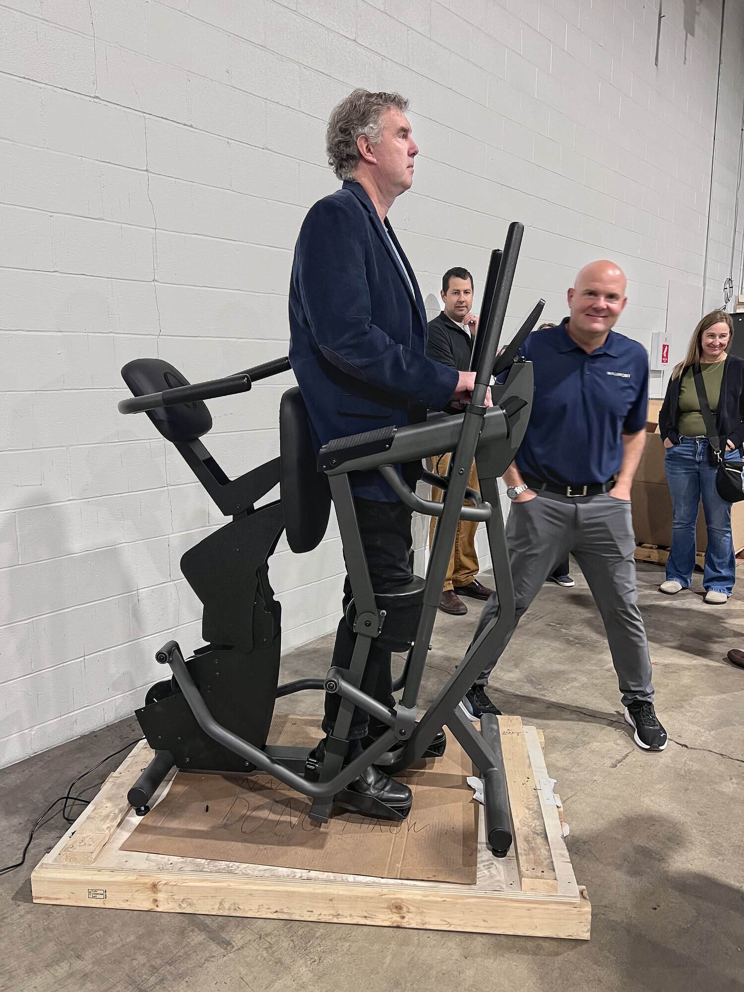 A guest stands in one of the first production WalkPort units