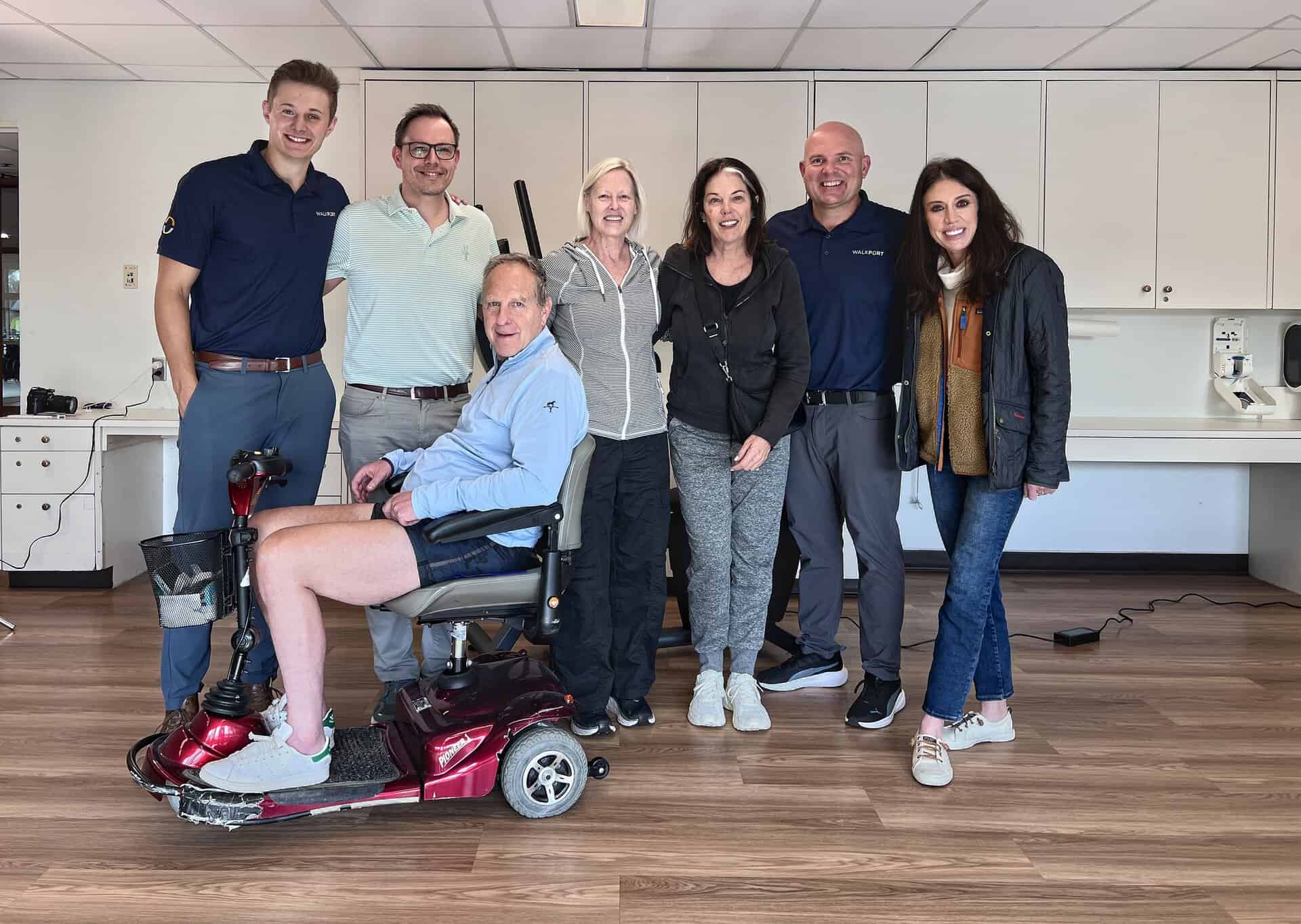 Guests and the WalkThera team gather by WalkPort at the open house